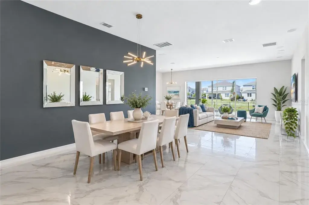 Virtually staged image. Dining.