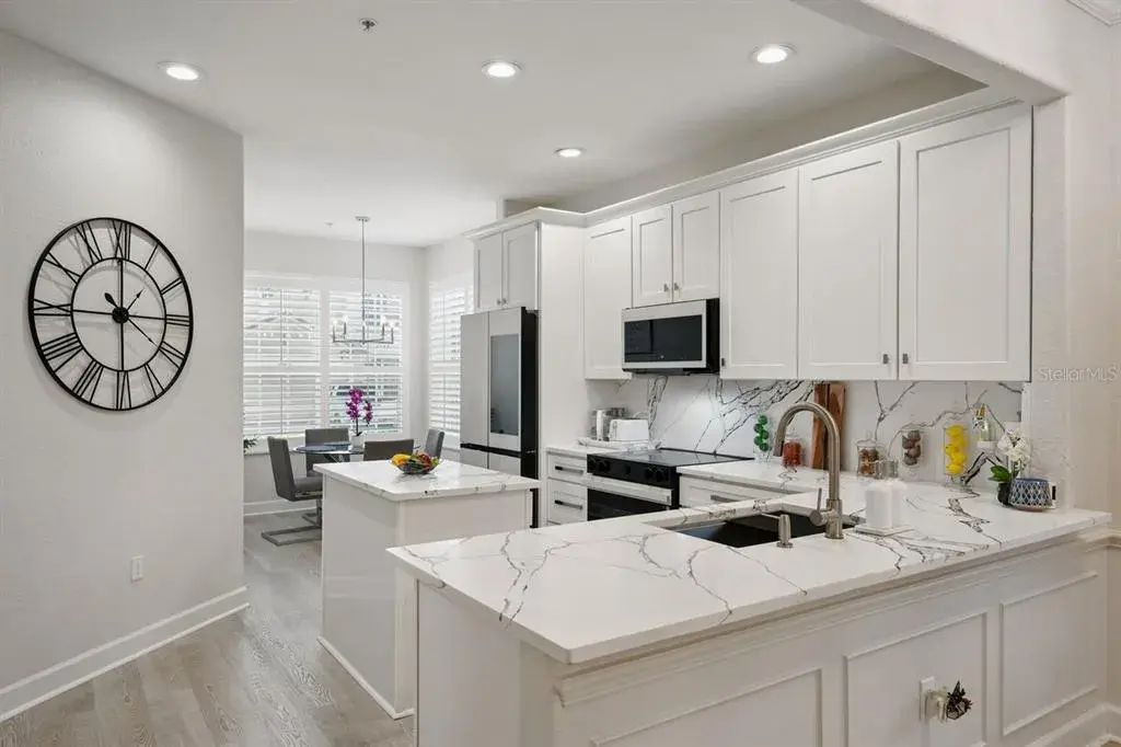 QUARTZ COUNTERTOPS AND NEWER APPLIANCES.