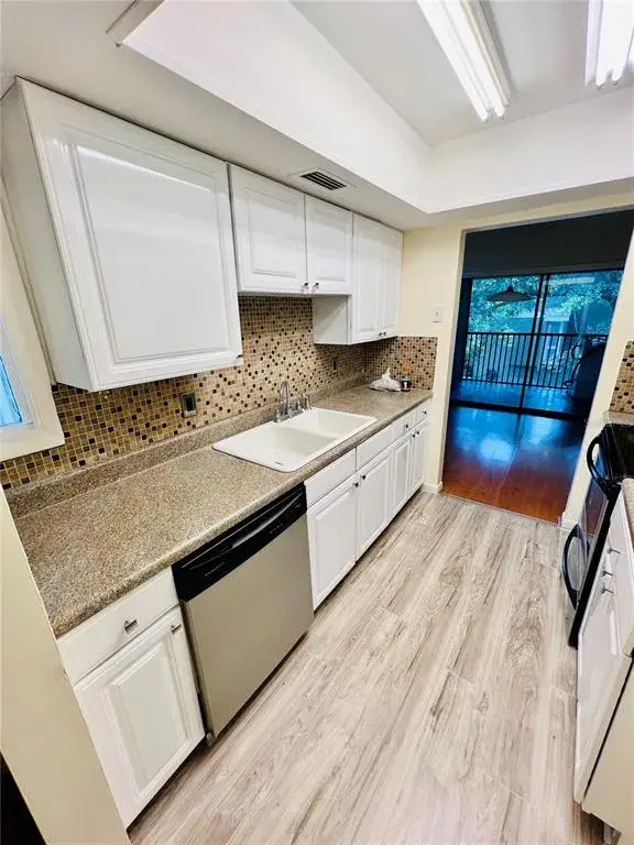 Property for sale at 6057 WINDHOVER DRIVE UNIT E-08, ORLANDO, FL, 32819