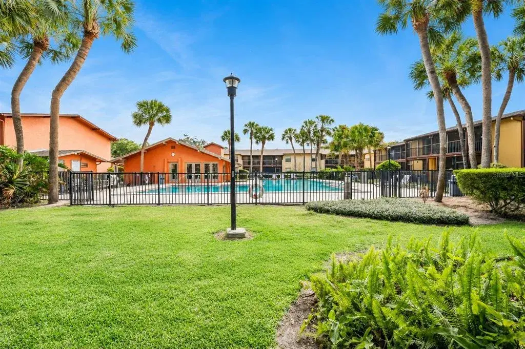 Community pool right outside your screened in patio.