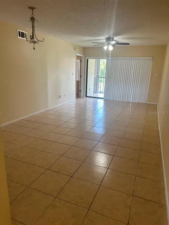 Property for sale at 3245 CANDLE RIDGE DRIVE UNIT 203, ORLANDO, FL, 32822
