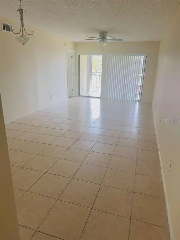 Property for sale at 3245 CANDLE RIDGE DRIVE UNIT 203, ORLANDO, FL, 32822