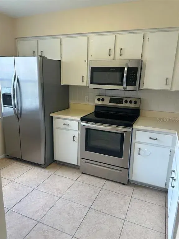 Property for sale at 3245 CANDLE RIDGE DRIVE UNIT 203, ORLANDO, FL, 32822
