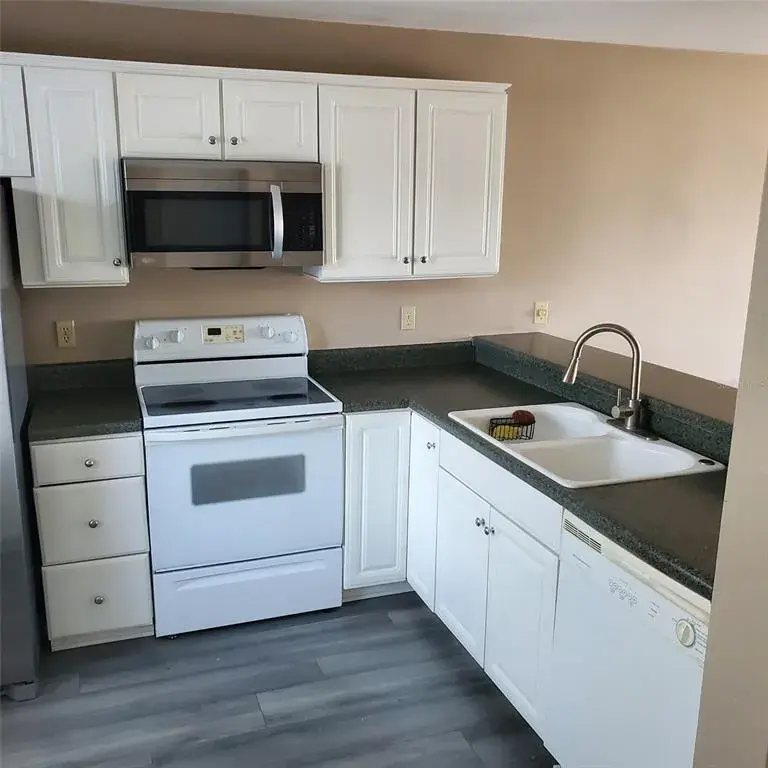 Property for sale at 2504 WOODGATE BOULEVARD UNIT 205, ORLANDO, FL, 32822