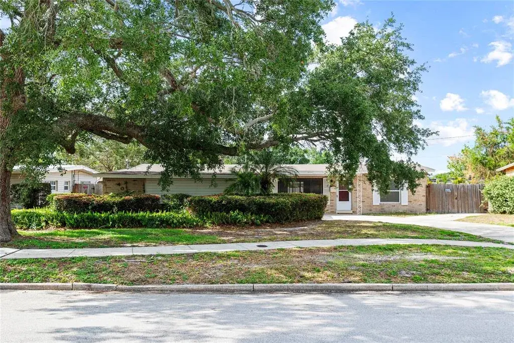 4 bedrooms/ 2 bathroom POOL home with attached 2 CAR GARAGE