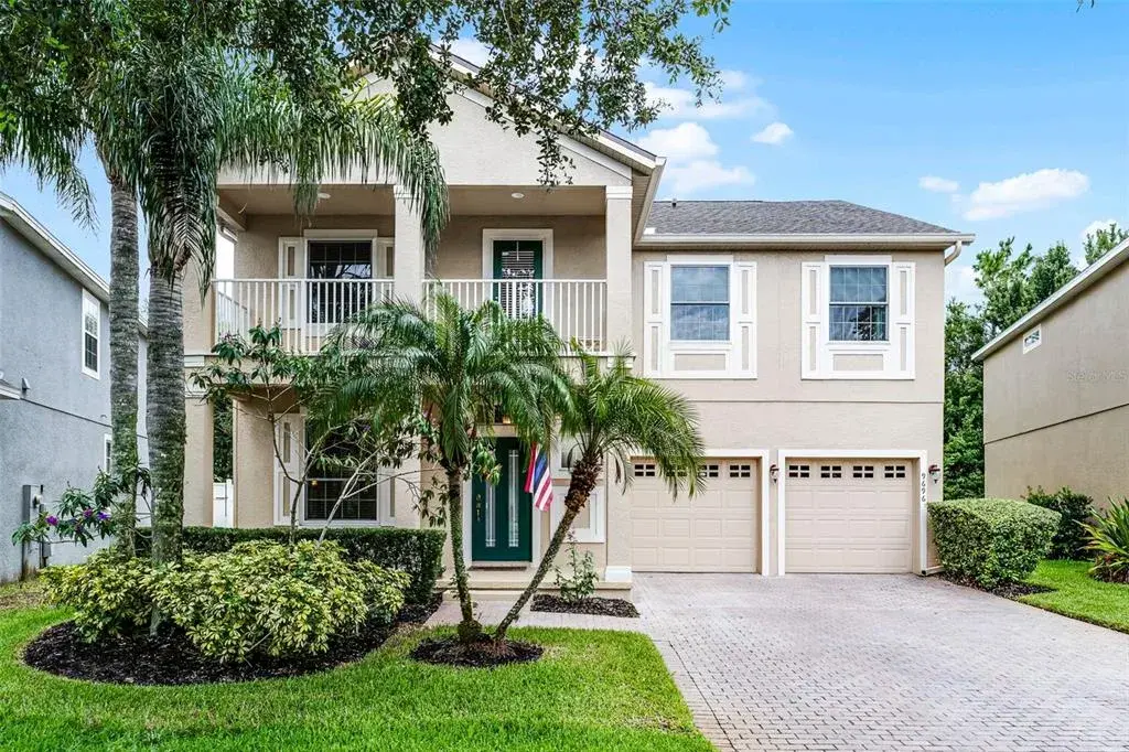 **WELCOME HOME** Multiple outdoor living spaces include a front porch, balcony and screened back porch too!