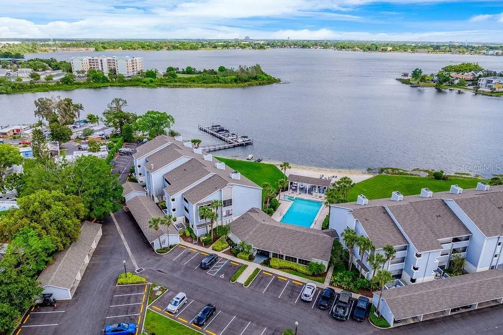This RENOVATED 2-bedroom, 2-bath unit in the desirable Fairview Vista community offers direct frontage on LAKE FAIRVIEW and PANORAMIC WATER VIEWS from your private SCREENED BALCONY!