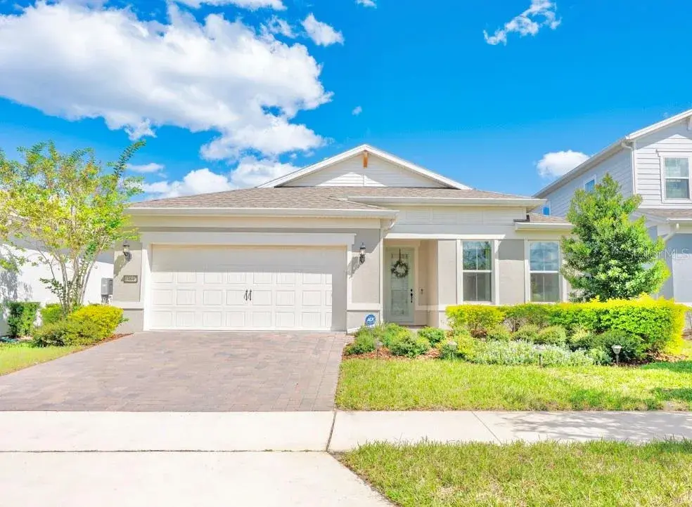 Welcome to the pinnacle of single story living in the sought-after gated community - Isles of Lake Nona!