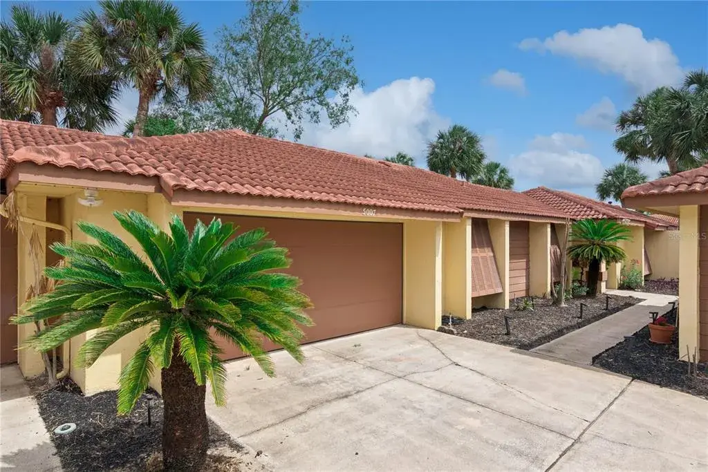 Front exterior with walkway to door