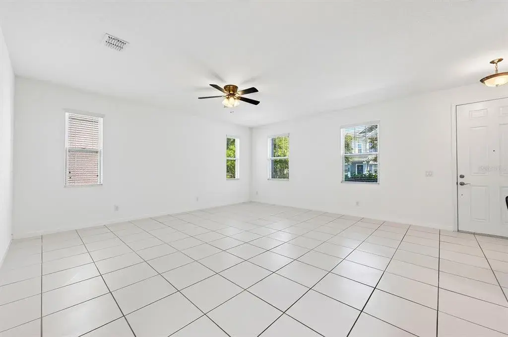 An abundance of windows fills the Living Room with NATURAL LIGHT, while the open sight lines make gathering with family or entertaining friends effortless.