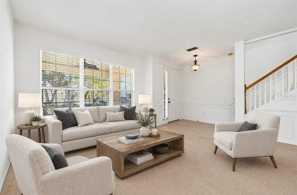 Formal living and dining spaces welcome you to come inside and make yourself at home. Virtually Staged.