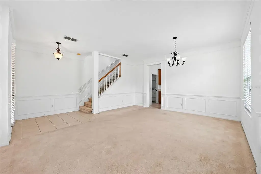 Combination formal living and dining off the foyer.
