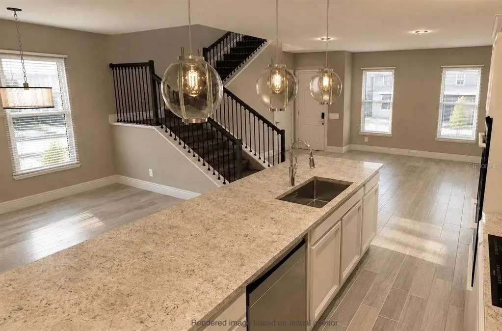 Kitchen/living/dining areas. VIRTUAL RENDERING BASED ON ACTUAL INTERIOR