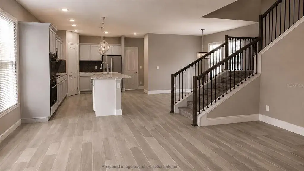 Kitchen/living/dining areas. VIRTUAL RENDERING BASED ON ACTUAL INTERIOR