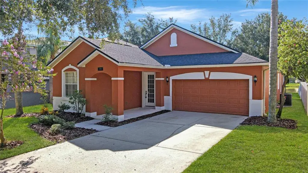 Well-Priced & Picturesque THREE-Bedroom, Two-Bath, Concrete-Block Executive-Style, Single-Family Home Backing to Large POND with Gorgeous WATER VIEWS with a Two-Car Garage in Fantastic Condition! HOLY COW!