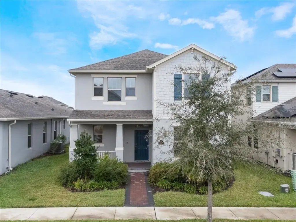 located on wide street with lots of parking, including 2 car garage in back
