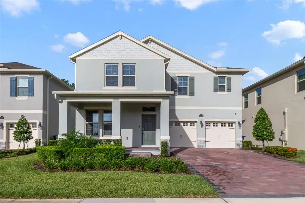 Immerse yourself in the beauty of MODERN LAKESIDE LIVING with this stunning 4-bedroom, 3.5-bath residence in the highly sought-after Waterleigh community of Winter Garden.