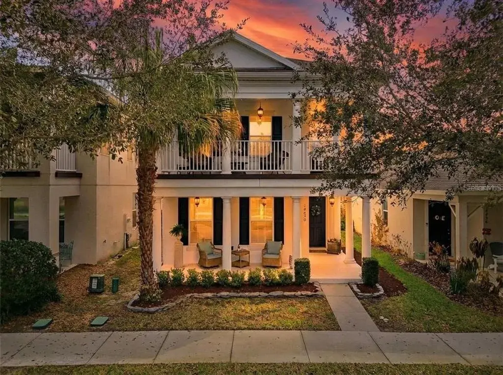 Charming covered front porch with timeless curb appeal.