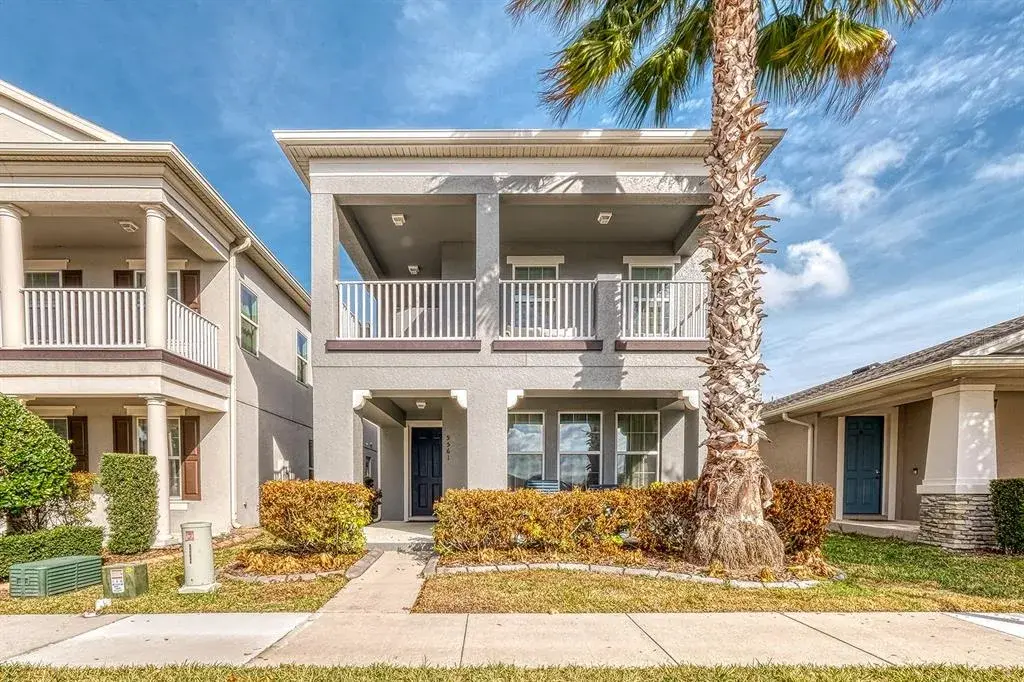 Two story, 2,470 sqft, sidewalks, inviting front porch and second story wrap-around balcony