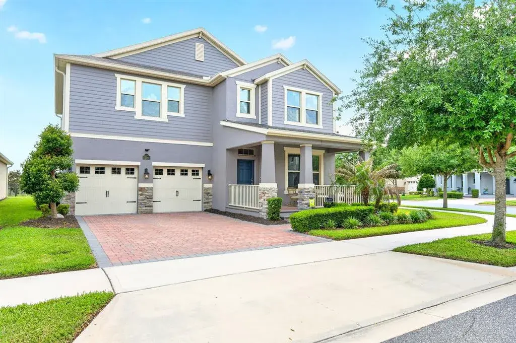 Built in 2019 and loaded with thoughtful UPGRADES, this spacious 4-bedroom, 3-bath home on a desirable .21 ACRE CORNER LOT in the sought-after Waterleigh community of Winter Garden delivers the perfect combination of space, style, and resort style living!