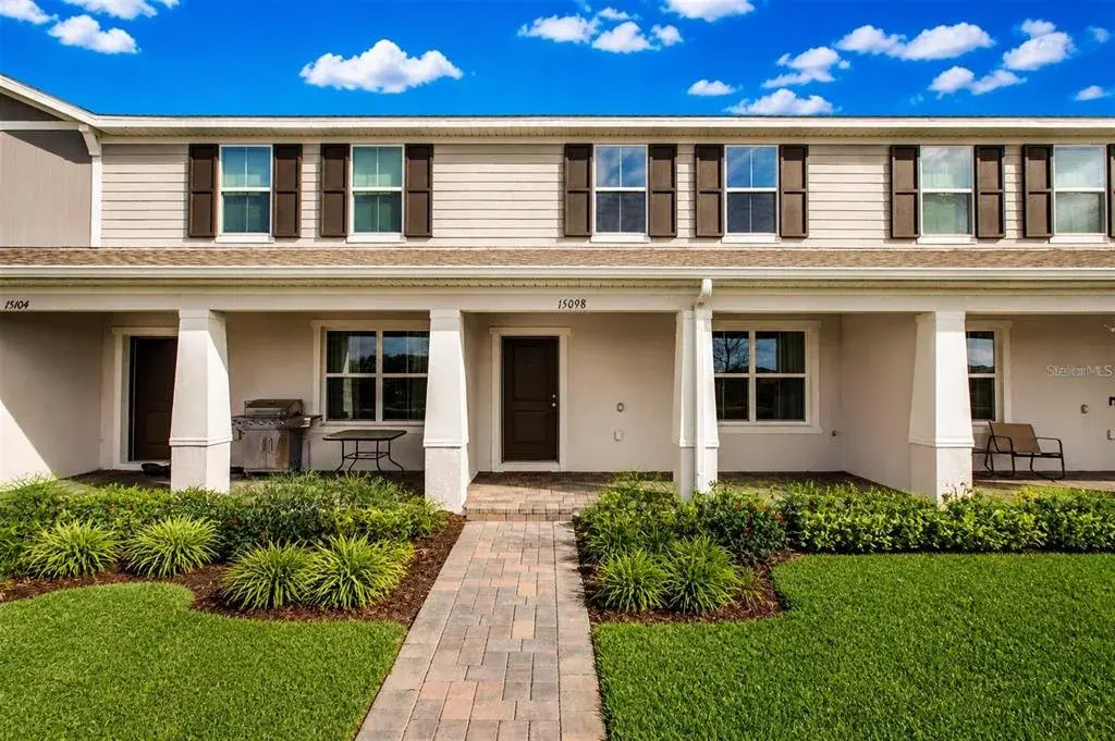 Welcome to Osprey Ranch, where modern design, LOW MAINTENANCE LIVING and an unbeatable Winter Garden location come together in this LIKE NEW ~ 2024 BUILT townhome that feels fresh, stylish and completely MOVE IN READY!