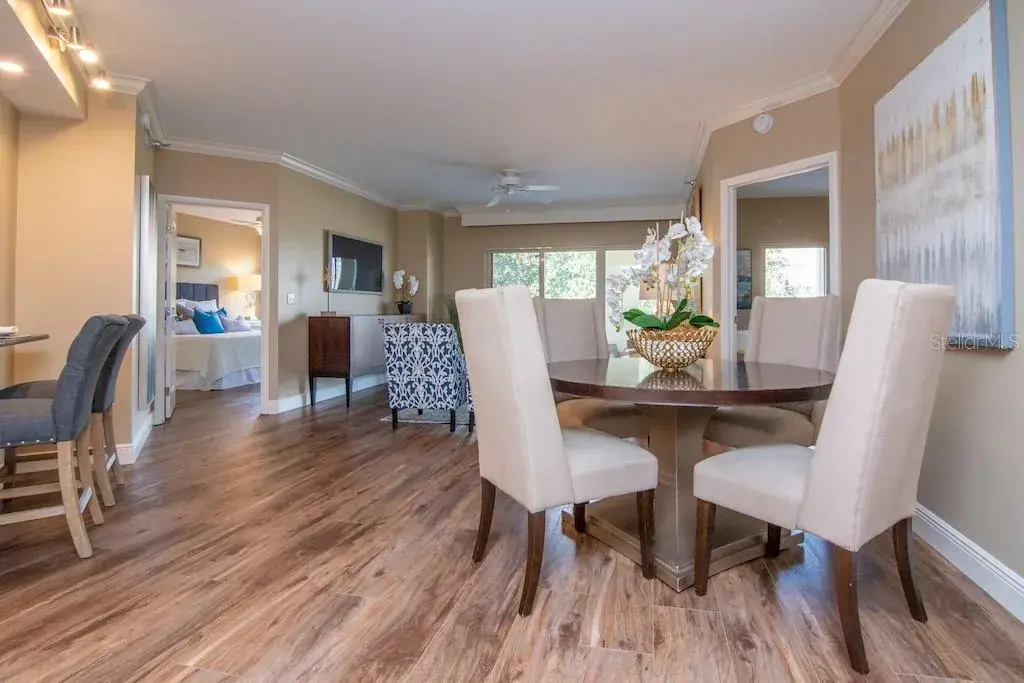 Enjoy an open-concept layout that seamlessly connects the kitchen, dining, and living areas.