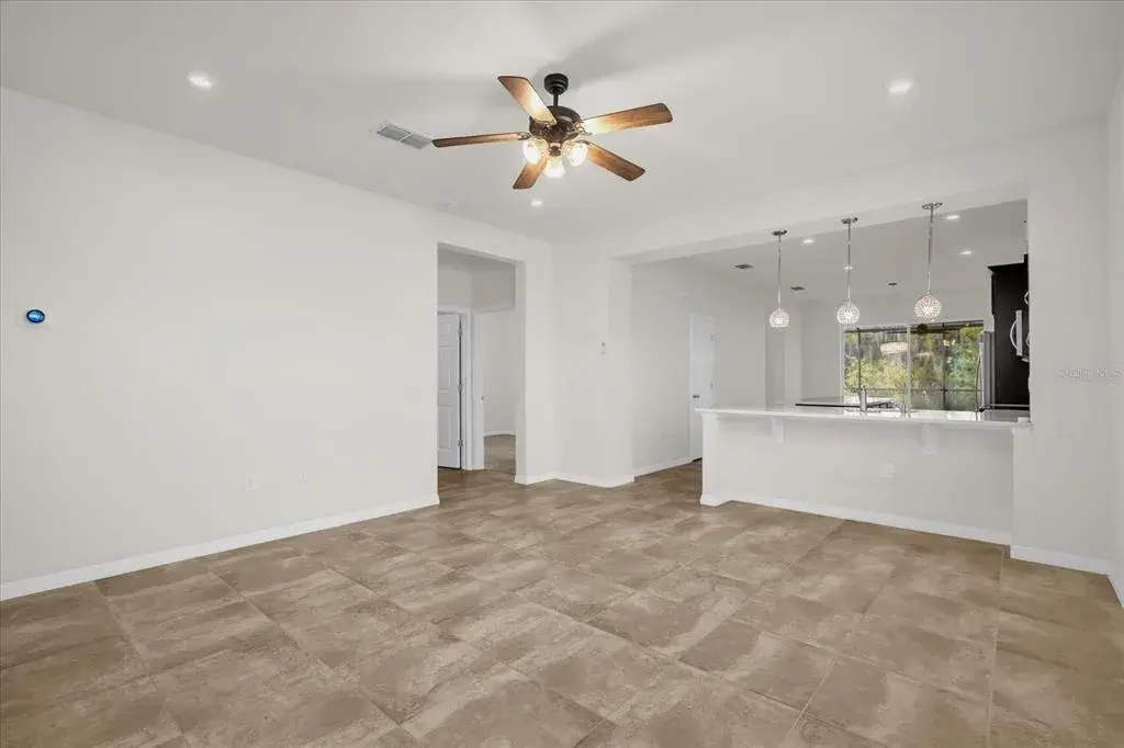 Living room with view of the kitchen