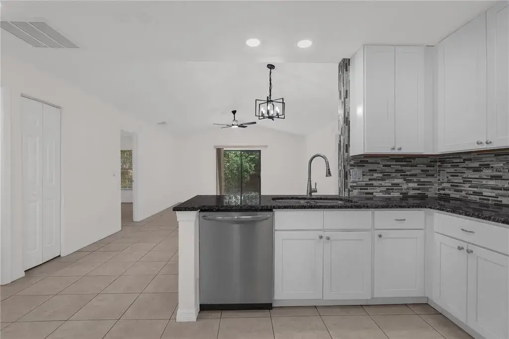 Beautifully updated kitchen with stainless steel appliances.