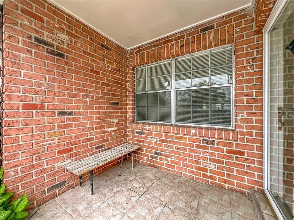 Private covered front entry welcomes you home.