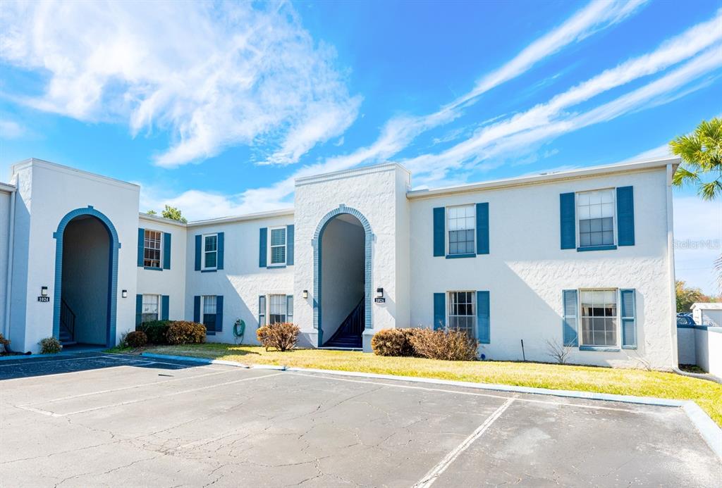 This FIRST FLOOR ~ END-UNIT condo is priced so you can bring your vision and make it your own!