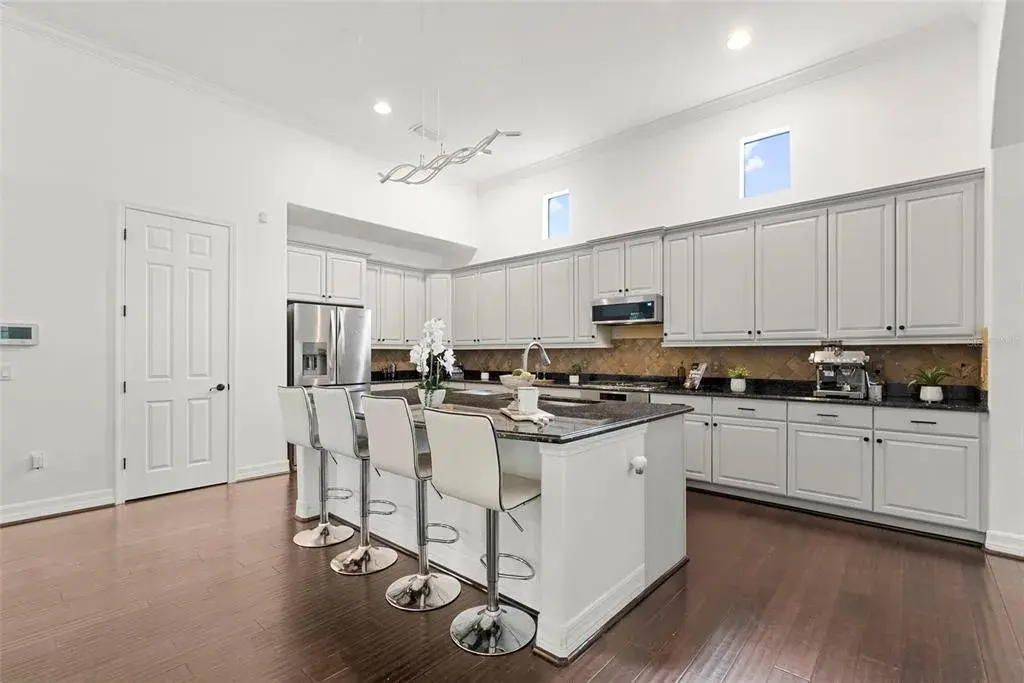 Kitchen-Expansive Island With Bar Seating