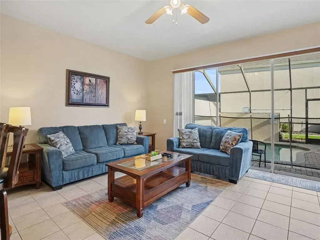 Open kitchen, dining living room with views of splash pool.