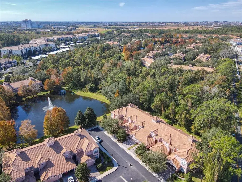 Well maintained gated community with sidewalks, ponds, and fountains.