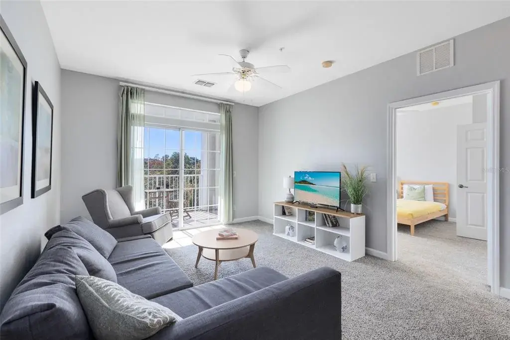 Living room with open floor plan and natural light