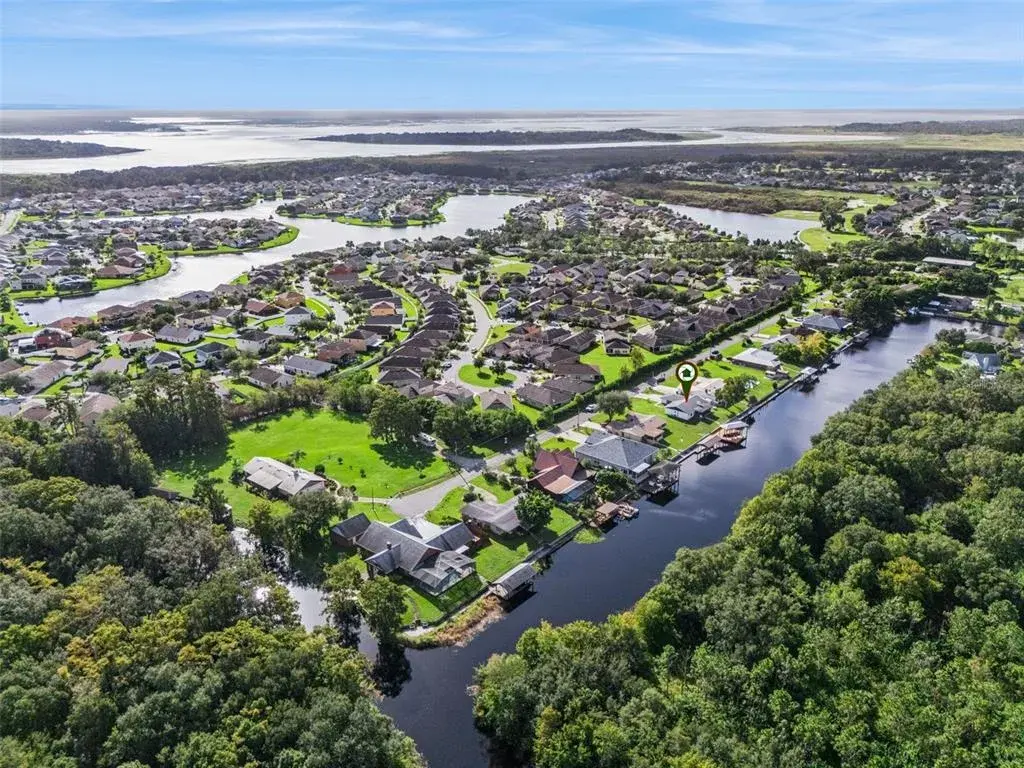 Perfectly situated on a premium canal-front lot offering picturesque views and direct access to the serene waters of West Lake Toho—leading through the chain of lakes to the Gulf or Atlantic.