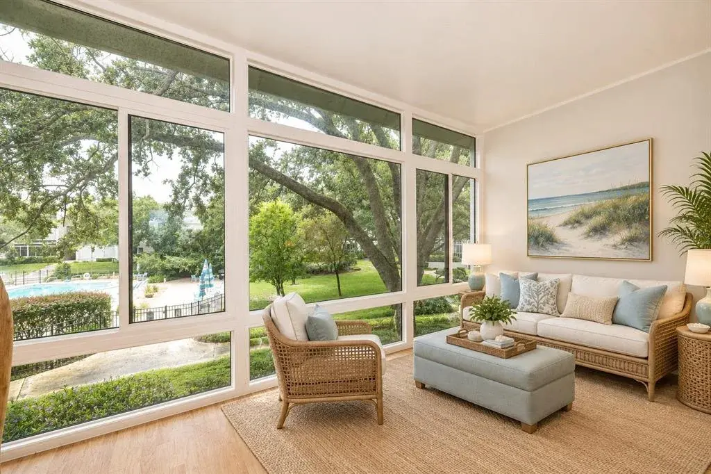 Florida room virtually staged. new energy efficient windows