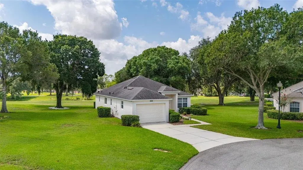 View of 3604 Kingswood Court with 18th hole and Clubhouse in background.