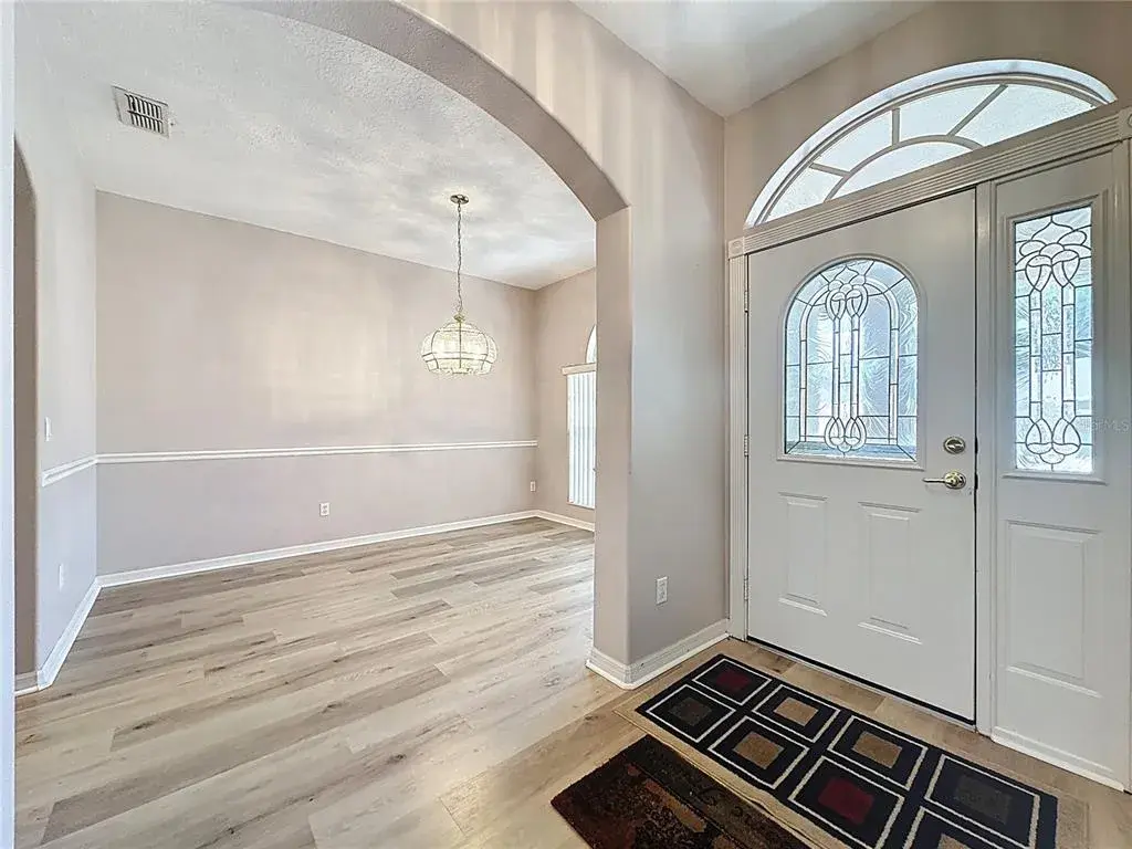 Foyer & view into dining room