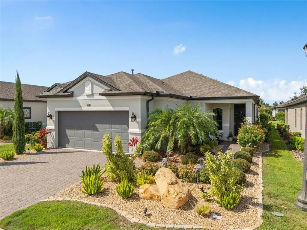 Front View with Beautiful Landscaping and Curb Appeal