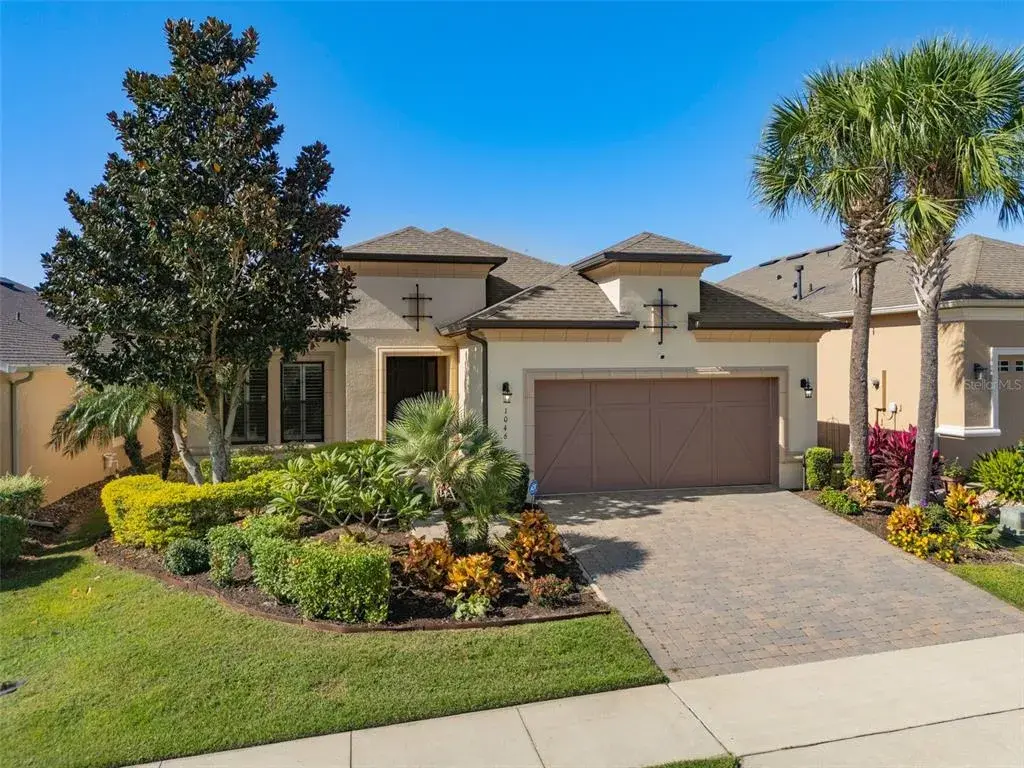 Beautifully Landscaped and Great Curb Appeal. This is a Tandem Garage with room for 3 cars.