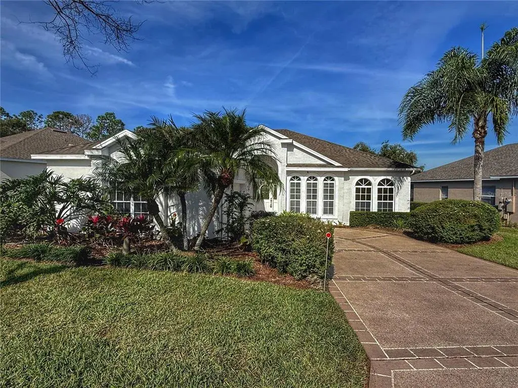Front exterior with gutters, garage has painted floors and a sink, located on a cul de sac
