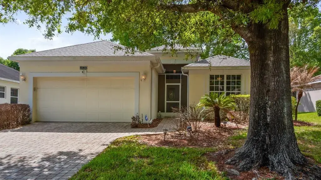 Front With Paver Driveway and Walkway