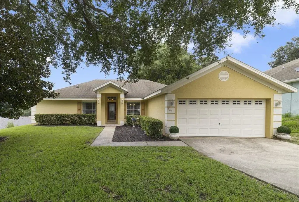 Nestled on more than a QUARTER OF AN ACRE in the welcoming community of East Lake Estates, this BEAUTIFULLY MAINTAINED 3-bedroom, 2-bath home offers the perfect blend of comfort, style, and outdoor living.
