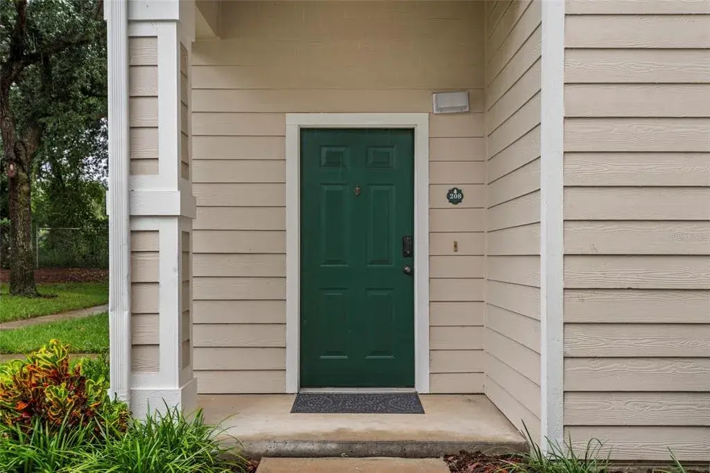 The front door has been freshly painted with the approved community color. Waiting on its new owner.