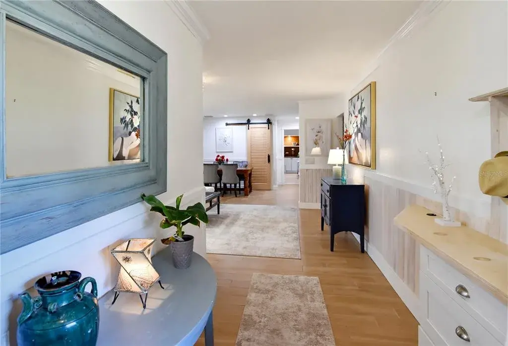 Bright, open-concept living and dining spaces with a beautifully redesigned kitchen.