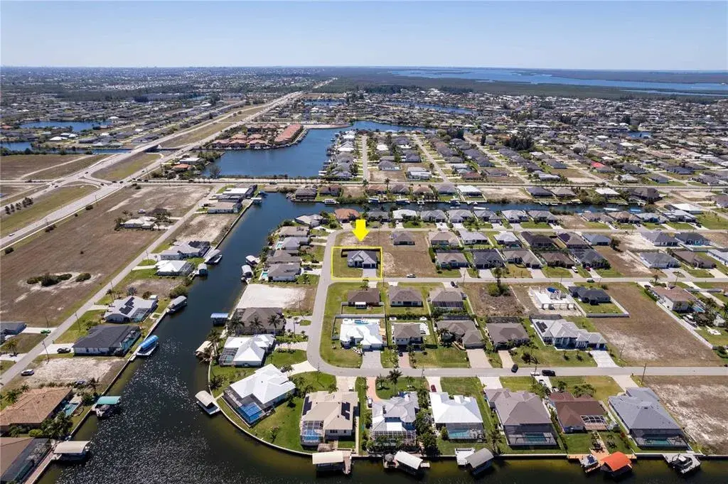 OVERSIZED corner lot NEW CONSTRUCTION CONTEMPORARY home on 0.259 acres in NW Cape Coral PARADISE!