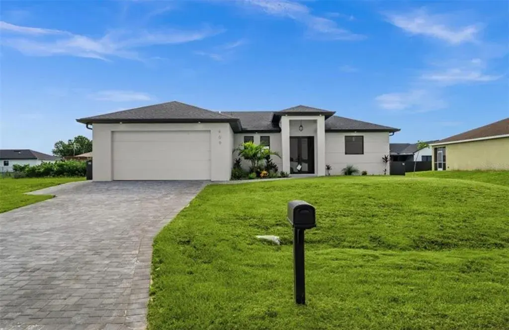 Property for sale at 409 NW 25TH PLACE, CAPE CORAL, FL, 33993