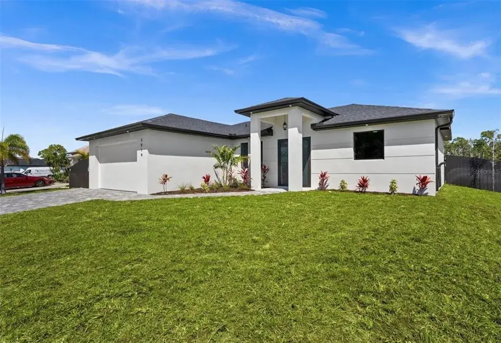 Property for sale at 409 NW 25TH PLACE, CAPE CORAL, FL, 33993