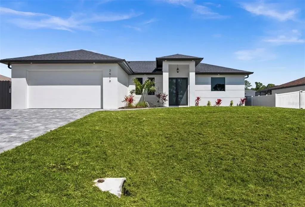 Property for sale at 409 NW 25TH PLACE, CAPE CORAL, FL, 33993