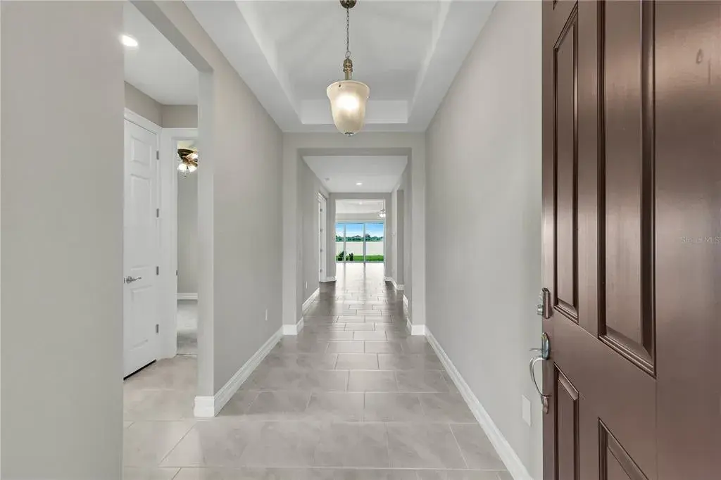 Property for sale at 447 SPRING HILL LAKE LOOP, CAPE CORAL, FL, 33993
